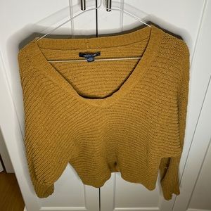 yellow sweater